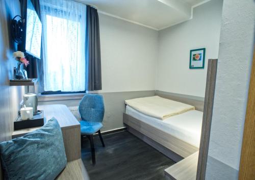 Кровать или кровати в номере Hotel-Restaurant Fück