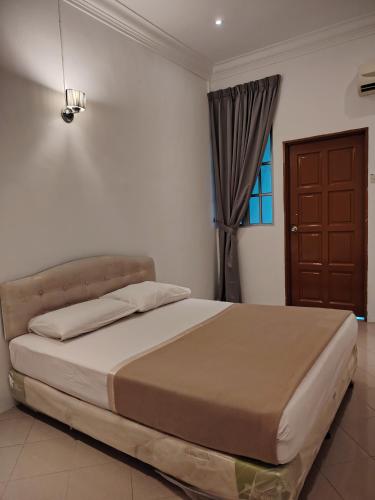 Ένα ή περισσότερα κρεβάτια σε δωμάτιο στο Pearl Villa 5 Bedroom Unit 3A