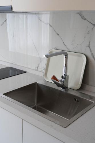 Η κουζίνα ή μικρή κουζίνα στο Design Hotel "Mamu Apartment" with kitchen and mountain views