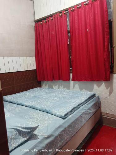 Ένα ή περισσότερα κρεβάτια σε δωμάτιο στο Blessed Guest House