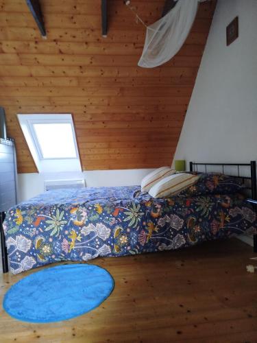 Postel nebo postele na pokoji v ubytování gite steir