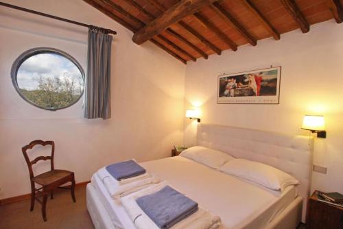 Katil atau katil-katil dalam bilik di Chianti Loft Ac Pool