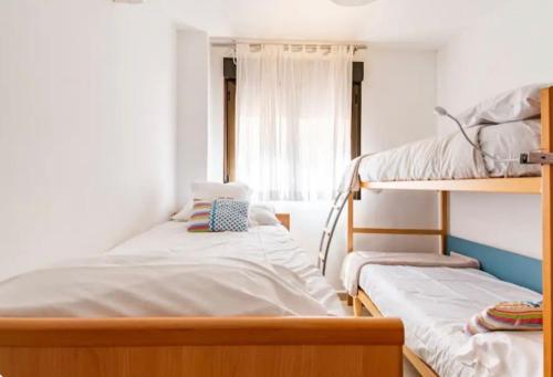 Vuode tai vuoteita majoituspaikassa Casa Dora Puzol