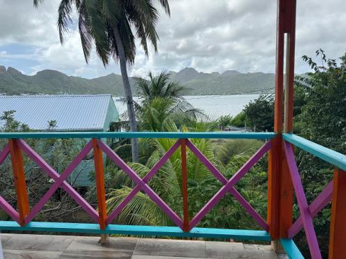 a view of the ocean from a balcony of a house at Shell Sea B & B in Santa Catalina Island