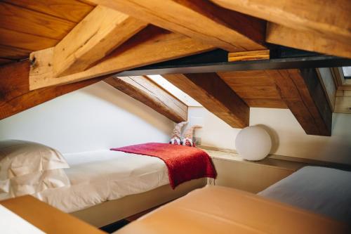 Postel nebo postele na pokoji v ubytování Maison Brenva Elegant A
