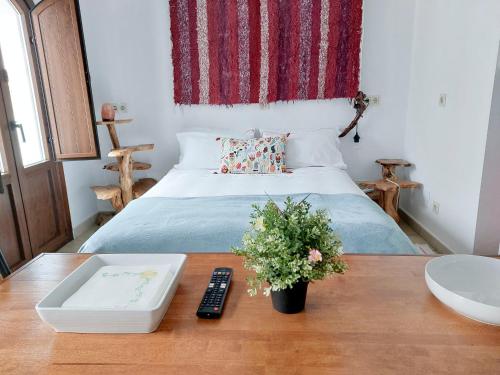 A bed or beds in a room at Centro de Arte