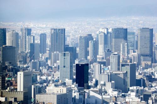 an aerial view of a large city with skyscrapers at W Osaka in Osaka