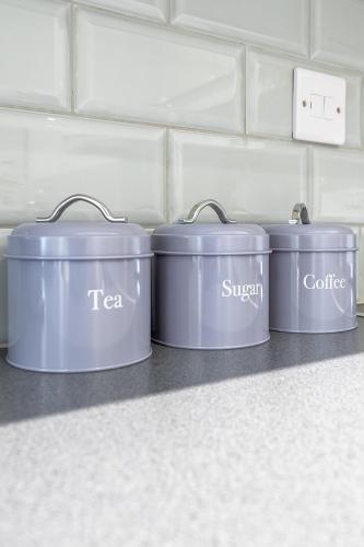 three blue pots sitting on a kitchen counter at Avalon luxury stays in Strood