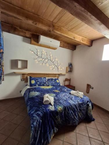 Postel nebo postele na pokoji v ubytování Etna Paradise Locazione Turistica