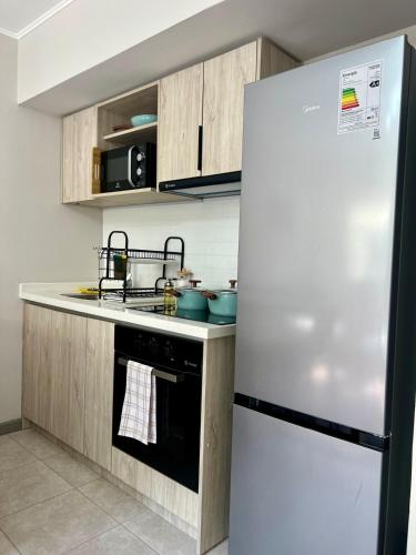 Dapur atau dapur kecil di Departamento Jacarandá