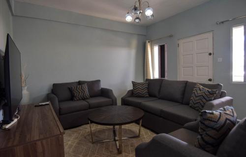Coin salon dans l'établissement Chic Getaway 2