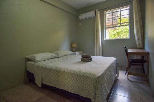 Ένα ή περισσότερα κρεβάτια σε δωμάτιο στο Chic Getaway 1
