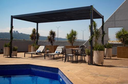 Bazén v ubytování Hotel Turotel Morelia nebo v jeho okolí
