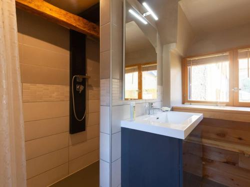 a bathroom with a sink and a shower at Maison typique 6 pers, proche Peyragudes et Loudenvielle - FR-1-695-70 in Loudenvielle