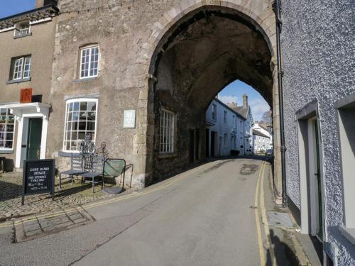 an archway over a street in a city at Elderflower Lodge in Grange Over Sands