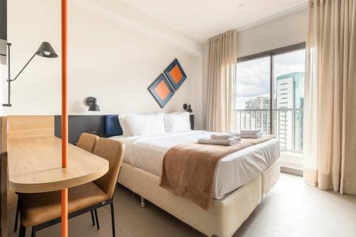 Ένα ή περισσότερα κρεβάτια σε δωμάτιο στο BHomy Soares