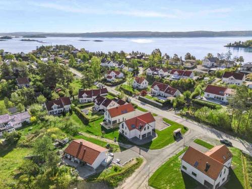 an aerial view of a home with the water at New apartment in quiet area close to Oslo in Asker