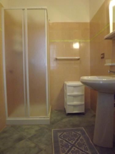 a bathroom with a shower and a sink at Agriturismo Quattro Mori in Porto Torres