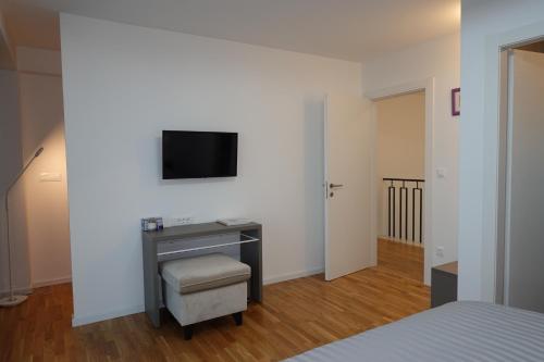 Ένα ή περισσότερα κρεβάτια σε δωμάτιο στο PERISKA Home