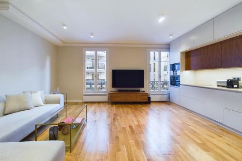 Μια τηλεόραση ή/και κέντρο ψυχαγωγίας στο Superbe appartement tout équipé au coeur de Levallois !