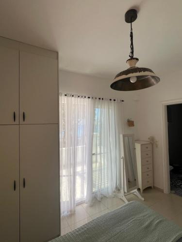 Кровать или кровати в номере Golden olive villa