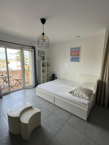 Posteľ alebo postele v izbe v ubytovaní Studio proche de la plage et du centre ville