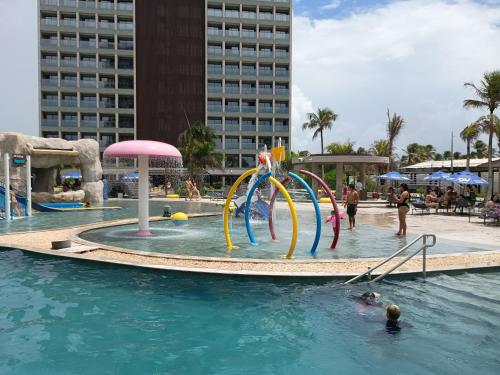 a pool with a water park with a water slide at Salinas Premium Resort in Salinópolis