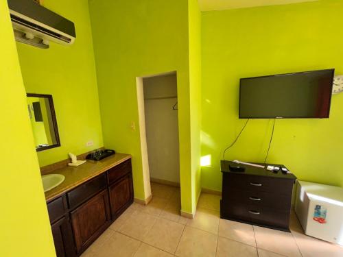 Televisor o centre d'entreteniment de Arawak Hotel