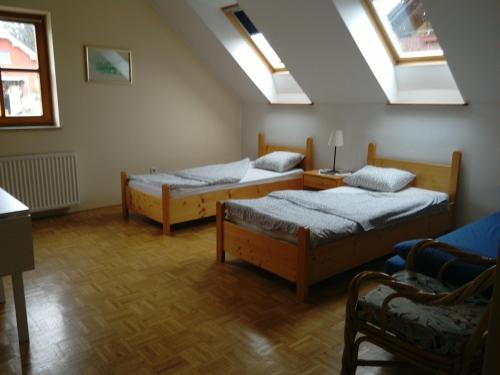 Postel nebo postele na pokoji v ubytování Tourist Farm Joannes