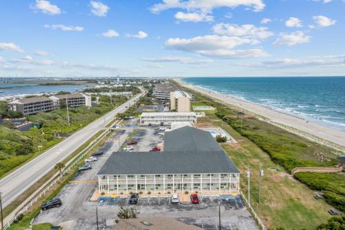an aerial view of a building next to the beach at Ocean Sands 136 in Atlantic Beach