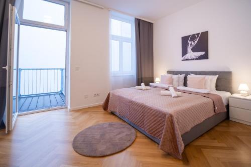 Ένα ή περισσότερα κρεβάτια σε δωμάτιο στο Home Sweet Home - Vienna Central