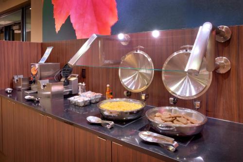 a kitchen with some food on a counter at Fairfield Inn & Suites by Marriott Salt Lake City Downtown in Salt Lake City