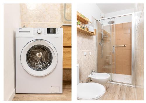 a bathroom with a washing machine and a toilet at Nel Borgo Antico in Riomaggiore
