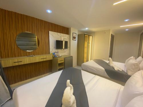 TV a/nebo společenská místnost v ubytování Rehana Pyramids Hotel
