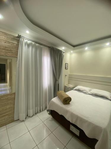 Ένα ή περισσότερα κρεβάτια σε δωμάτιο στο Casa Fernandes