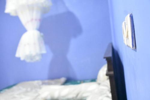 Кровать или кровати в номере Mayo Homestay