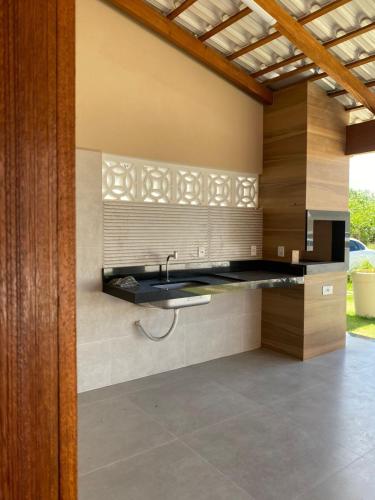 Kuchyň nebo kuchyňský kout v ubytování Casa de Praia em Guaratiba