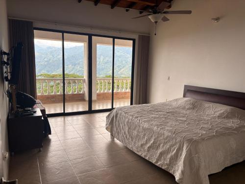 Katil atau katil-katil dalam bilik di Hacienda La Perla- Mesa de los Santos