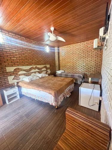 Postel nebo postele na pokoji v ubytování Pousada Tapera