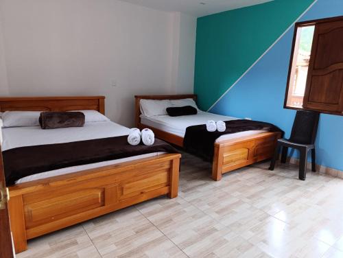 Postel nebo postele na pokoji v ubytování Hotel Macao