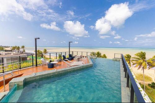 Πισίνα στο ή κοντά στο Brezze - Flat Bessa - pé na areia