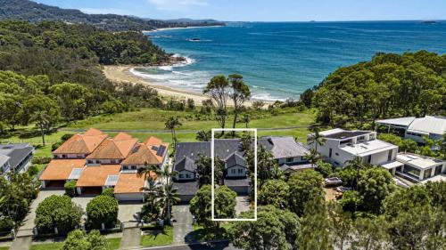 an aerial view of a house with the beach at Solara - Sleeps 8, Beach, Walk To Resorts, Views in Coffs Harbour