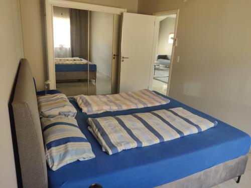 Casa Connect in Barrio Esperanza, 3 Zimmer, Küche, Parking, Sauna, ruhig, central, modern!にあるベッド