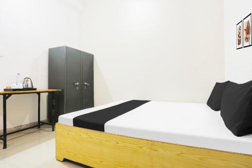 Postel nebo postele na pokoji v ubytování Hotel O CityMax