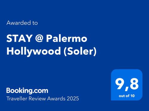 Una señal azul con las palabras permanece o palma hollywood vendido en STAY @ Palermo Hollywood (Soler), en Buenos Aires
