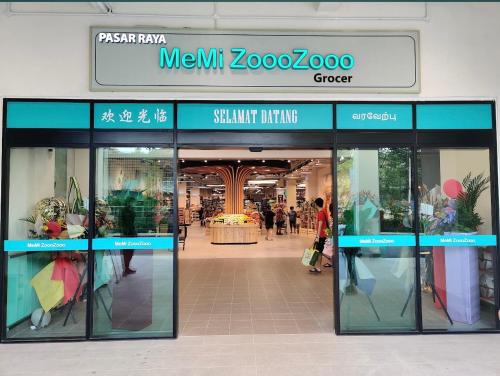 a store with glass doors in a shopping mall at Connaught Avenue in Kuala Lumpur
