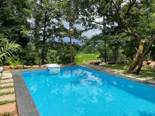 Bazén v ubytování Tattva - Mountain view Pvt pool nebo v jeho okolí