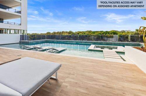 an image of a swimming pool in a house at Bokarina Beach Apartments, an Ascend Collection Hotel in Bokarina
