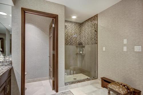 a bathroom with a shower and a tub at Luxury Ski-In 3 Br Penthouse Inside Pines Lodge, Sleeps 10! Condo in Beaver Creek