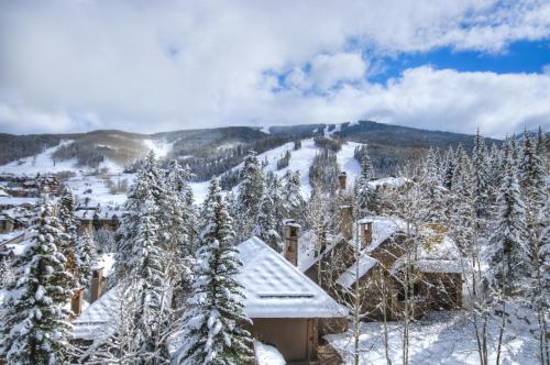 a house with snow covered trees and a mountain at Luxury Ski-In 3 Br Penthouse Inside Pines Lodge, Sleeps 10! Condo in Beaver Creek